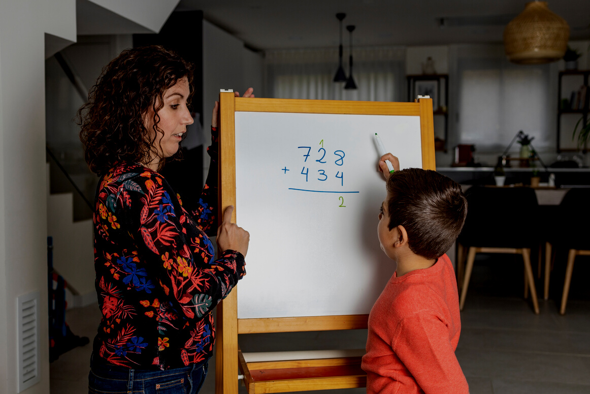 Little Boy Learning Maths with Kis Mon at Home